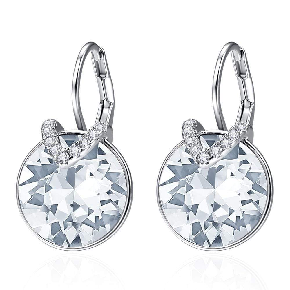Sparkling silver drop earrings, an elegant accessory for women's party and fashion jewelry.
