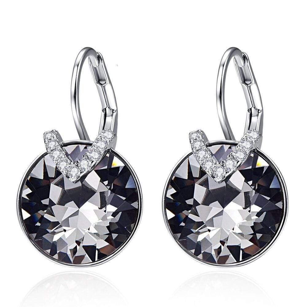 Women's dazzling silver drop earrings, perfect for adding sparkle and elegance to any outfit.