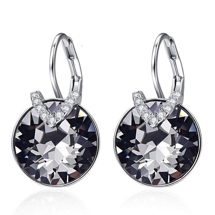 Women's dazzling silver drop earrings, perfect for adding sparkle and elegance to any outfit.
