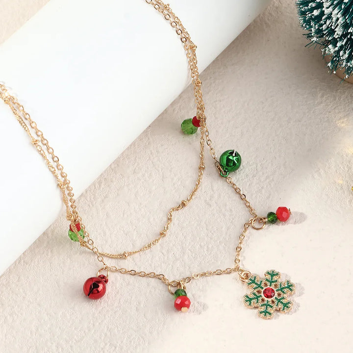 Festive women's dazzling snowflake pendant necklace. Colorful and sparkling winter jewelry gift.