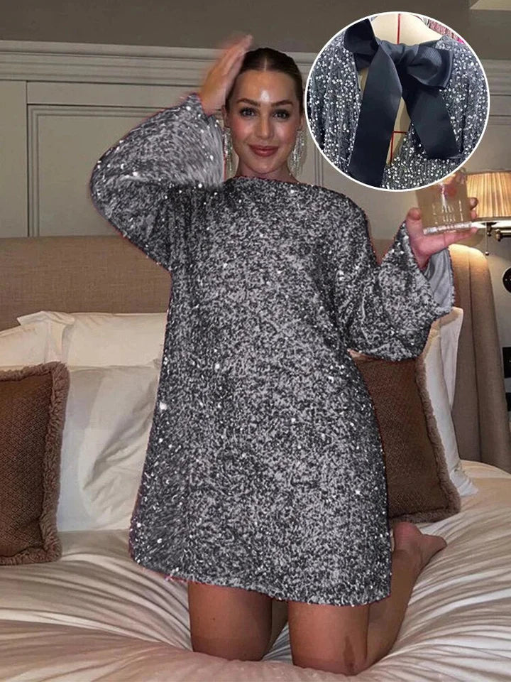 Glamorous women's glitter midi dress, ideal for parties, evenings, and trendy festive events.