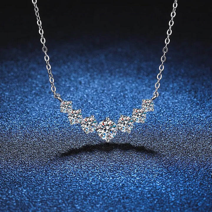 Brilliant cut Moissanite gemstone set in a delicate 925 Sterling Silver necklace for women.