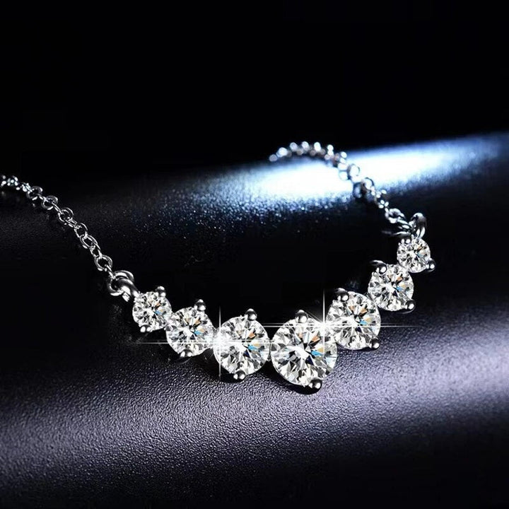 Sparkling Moissanite pendant on a sleek 925 Sterling Silver chain, elegant women's jewelry.