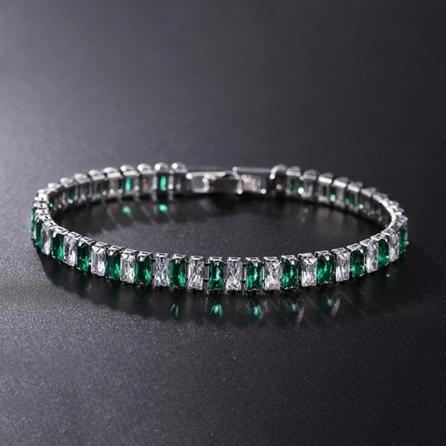 Rhodium-plated women's tennis set with brilliant cubic zirconia, necklace & bracelet.