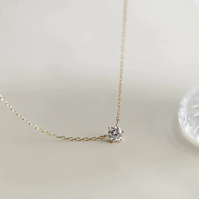 Dainty women's zircon sparkle necklace, featuring dazzling stones and a polished gold plated finish.