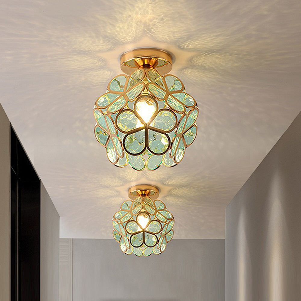 Artistic iron & glass ceiling lamp, handcrafted with a beautiful flower motif for elegant lighting.