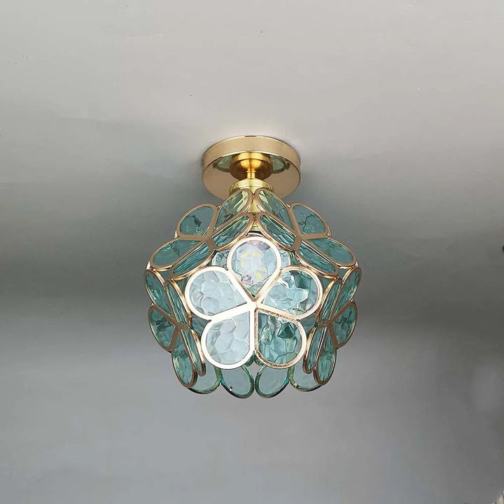 Elegant glass floral ceiling lamp, decorative lighting with a flower pattern for stylish home interiors.