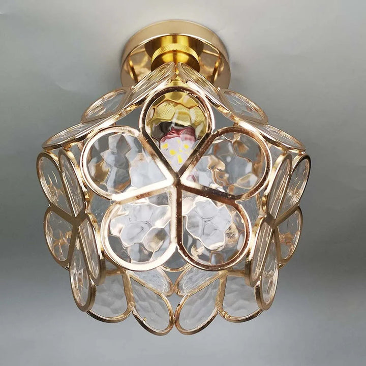 Modern floral glass ceiling lamp, ideal decorative lighting for a contemporary hallway or bedroom.