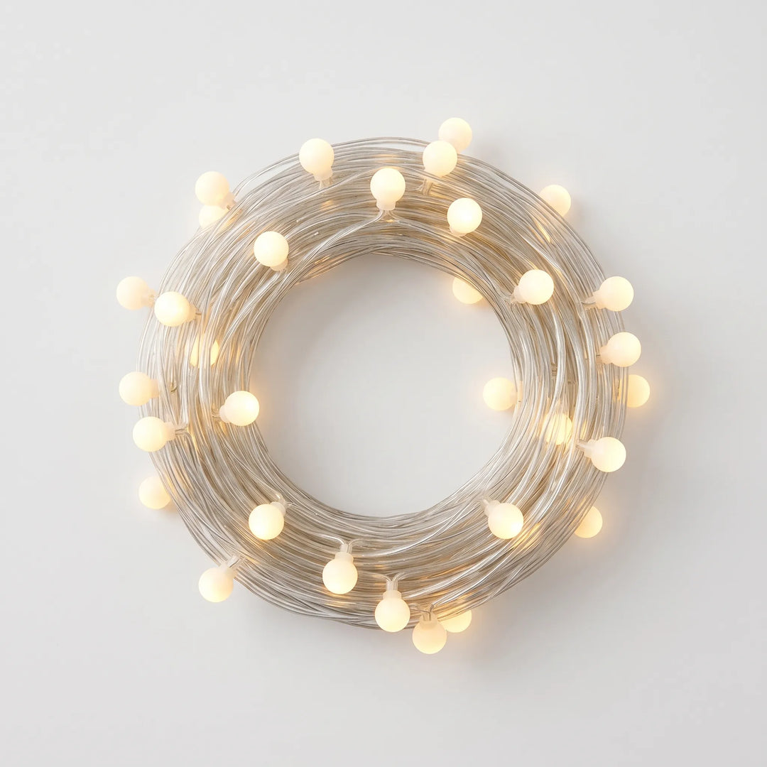 Cozy LED globe string lights for bedroom & indoor decor. USB/battery powered fairy lights create warm ambient lighting.