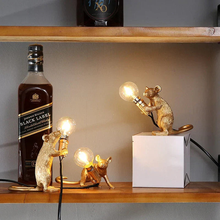 Animal figure desk lamp, a cute mouse design offering warm accent lighting.