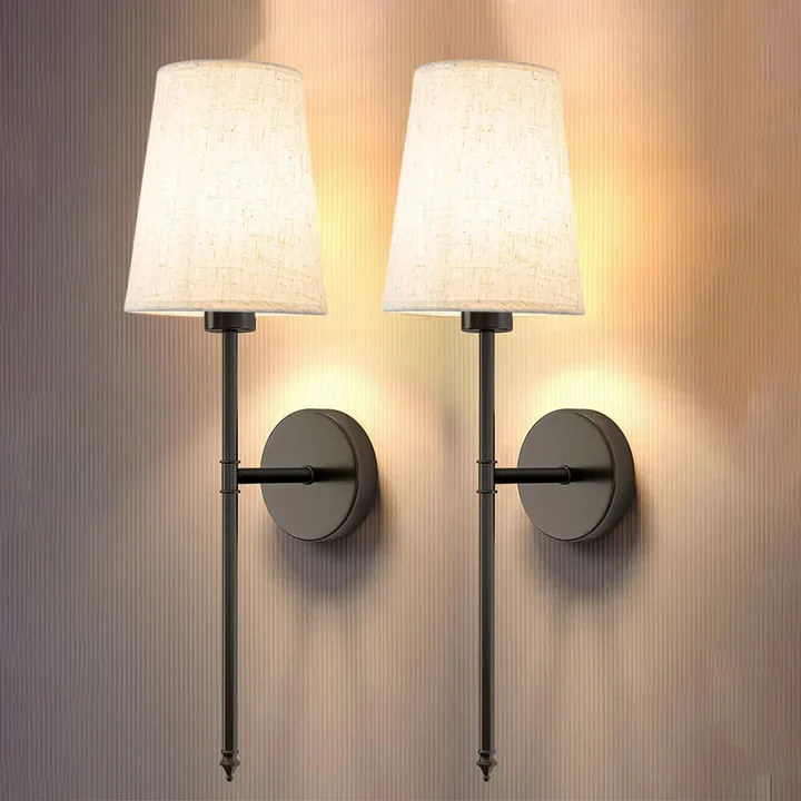 Battery-operated wireless fabric wall sconces (2-pack). Easy install decorative lighting for modern home decor.