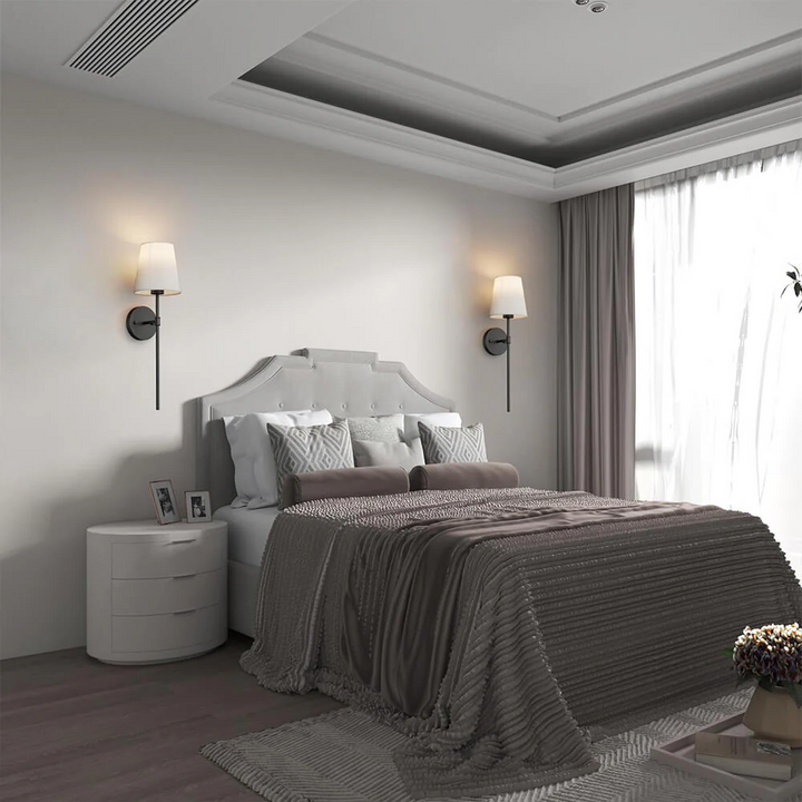 Two decorative wireless fabric wall sconces with free bulbs. Perfect for enhancing home decor with ambient lighting.