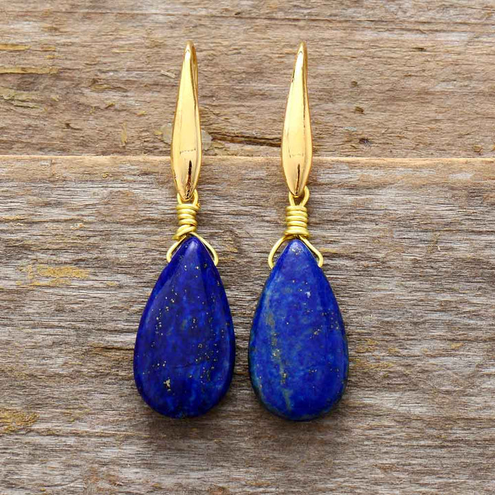 Dromers Selene gold plated drop earrings with deep blue lapis lazuli gemstones