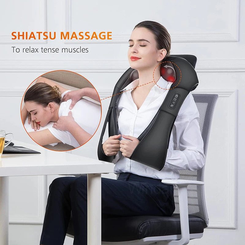 User wearing a Shiatsu neck & shoulder massager, experiencing deep kneading & heat for pain relief & wellness.