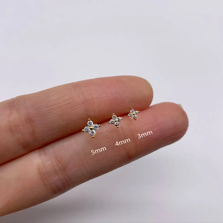 Sparkling silver flower stud earrings for women, adorned with CZ pave, a delicate and elegant design.