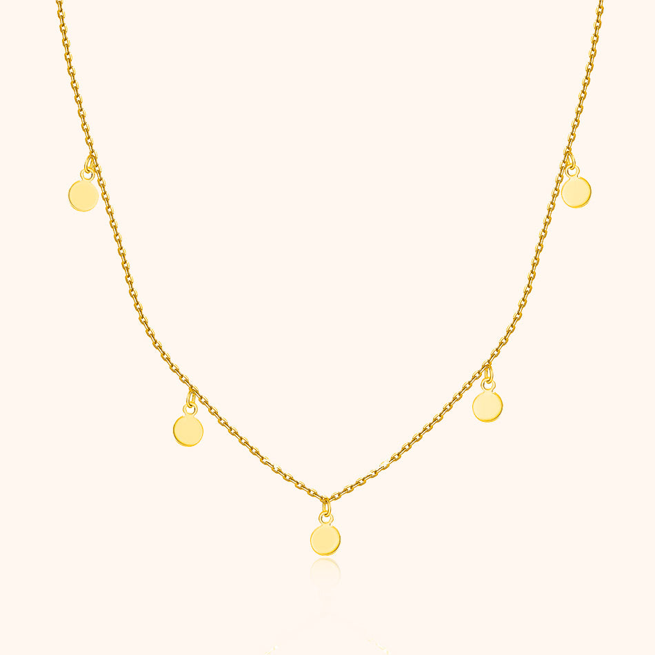 Women's small circle pendant necklace, minimalist design in gold plated sterling silver. Delicate adjustable jewelry gift.