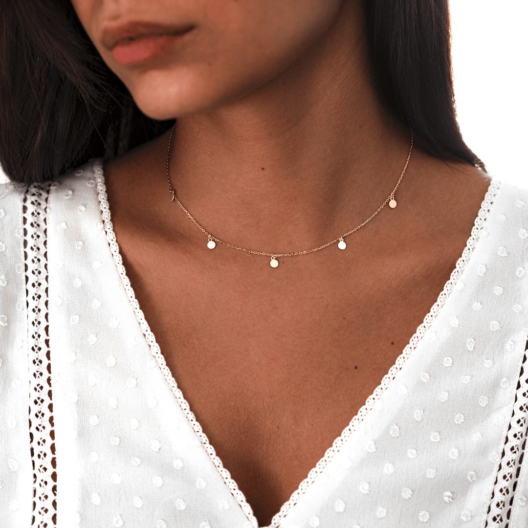 Gold plated silver small circle pendant necklace for women. Delicate minimalist design, adjustable chain, elegant jewelry.