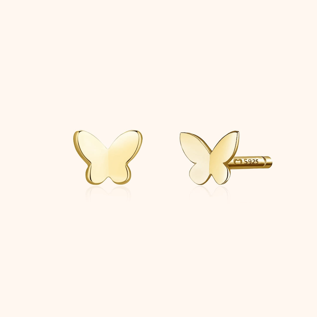 Tiny, intricately designed butterfly stud earrings in shiny gold-plated sterling silver for women.