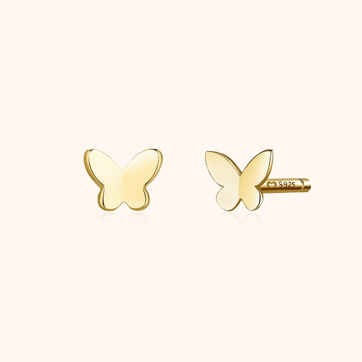 Tiny, intricately designed butterfly stud earrings in shiny gold-plated sterling silver for women.