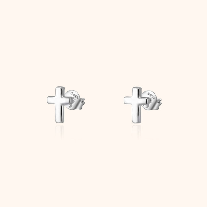 Delicate gold plated sterling silver cross stud earrings for women, perfect for everyday wear.
