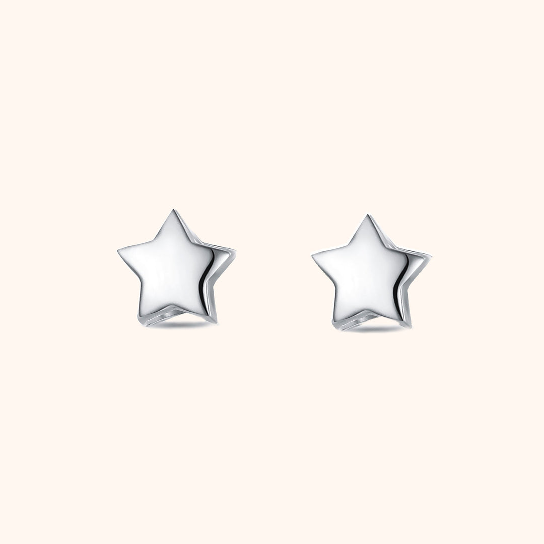 Delicate gold plated sterling silver star stud earrings for women, minimalist celestial jewelry, everyday wear.