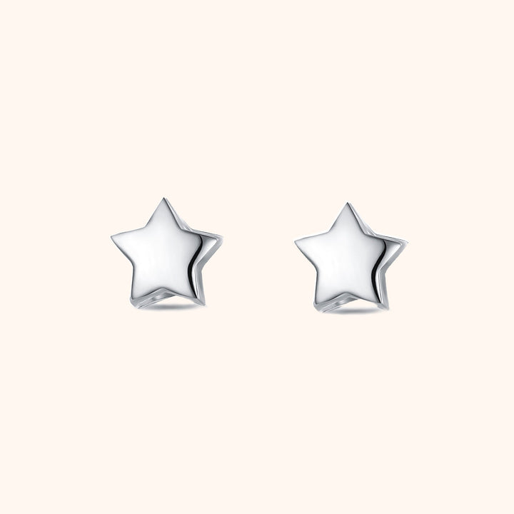 Delicate gold plated sterling silver star stud earrings for women, minimalist celestial jewelry, everyday wear.