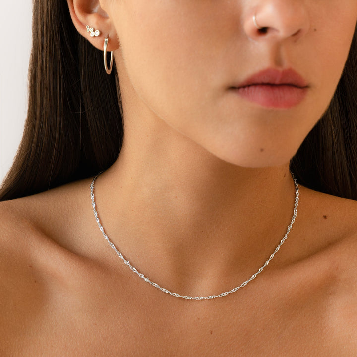 Chic adjustable wavy pendant necklace, a delicate gold plated sterling silver gift for women's jewelry collection.