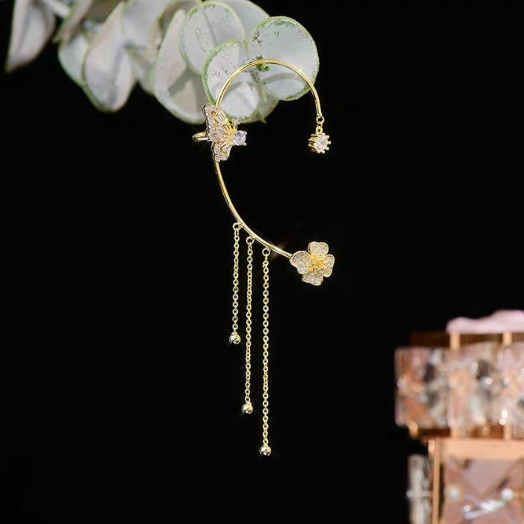 Close-up of elegant silver butterfly drop earrings, intricate detail, hypoallergenic jewelry