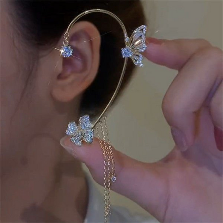 Pair of gold Aurelia butterfly drop earrings, shimmering and delicate, ideal for women