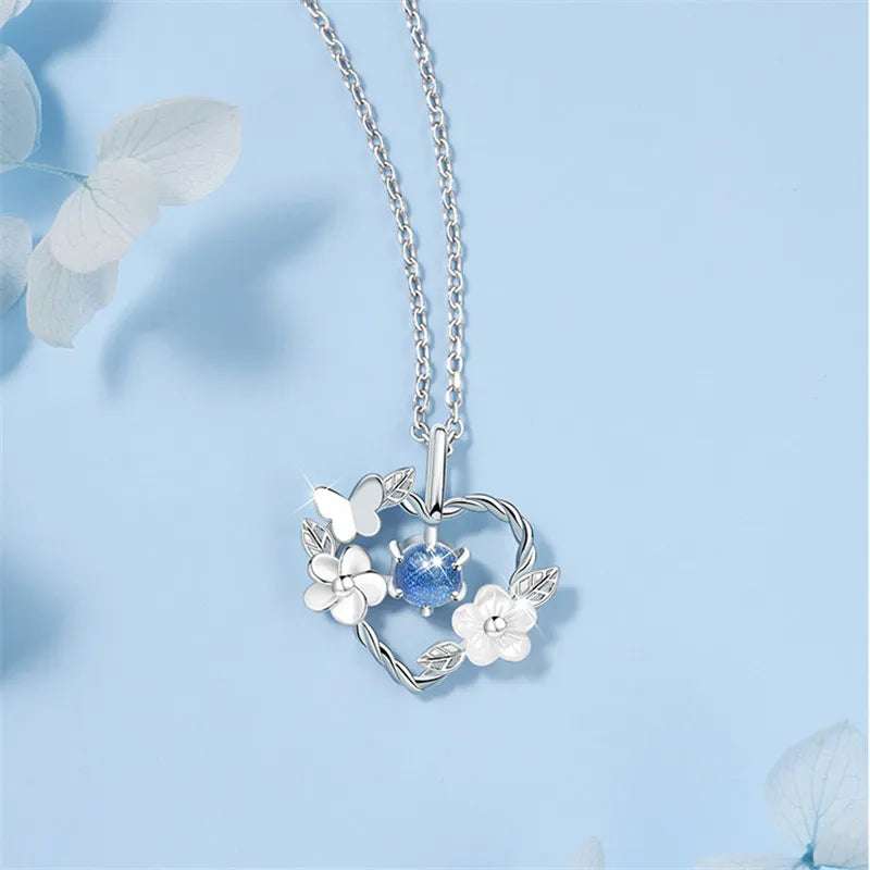 Elegant silver necklace featuring a unique seashell flower heart pendant, perfect nature-inspired jewelry.