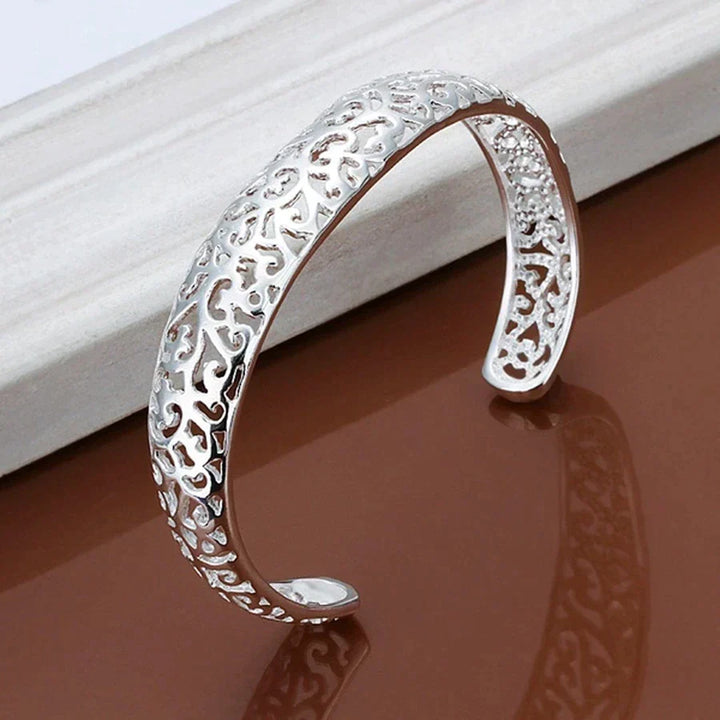 Elegant women's delicate silver bracelet, a timeless fine jewelry wrist accessory. Ideal sterling silver gift for her.