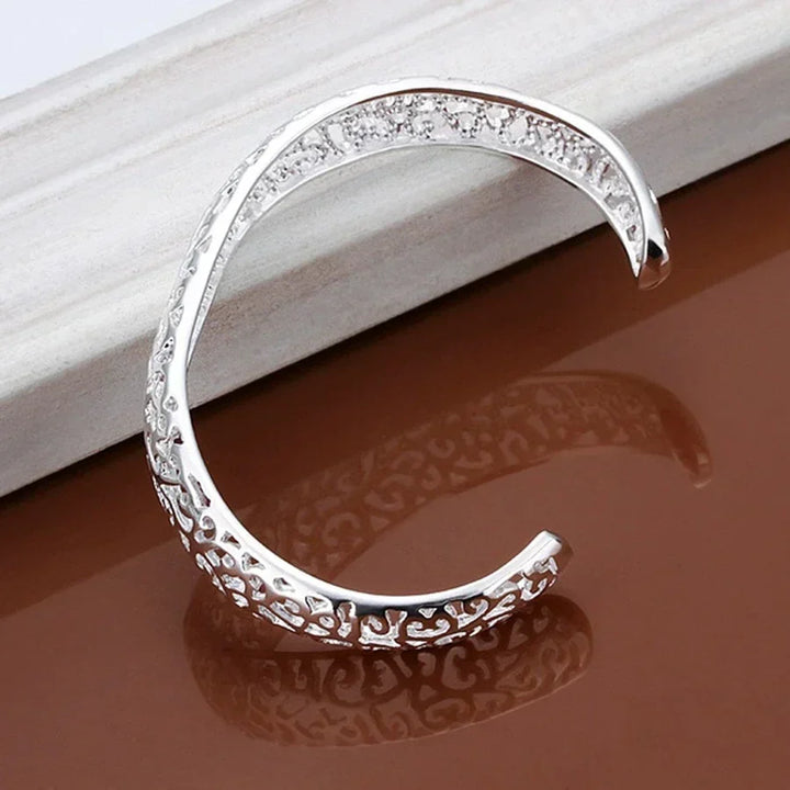 Thin, delicate sterling silver bracelet, an elegant and timeless women's wrist accessory suitable for everyday wear.