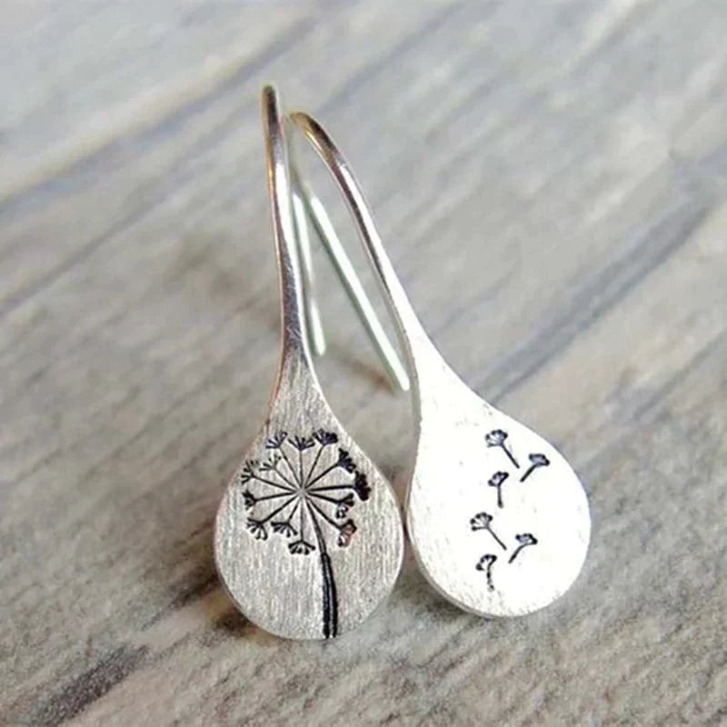 Delicate sterling silver dandelion stud earrings for women, perfect nature-inspired everyday fine jewelry.