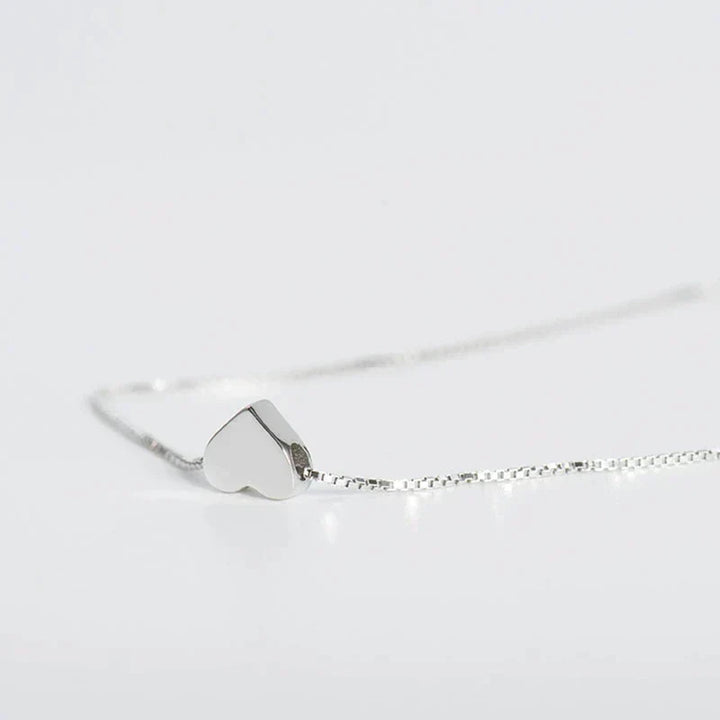 Smooth heart sterling silver necklace, minimalist womens jewelry. A delicate and timeless accessory, ideal for elegant styling.