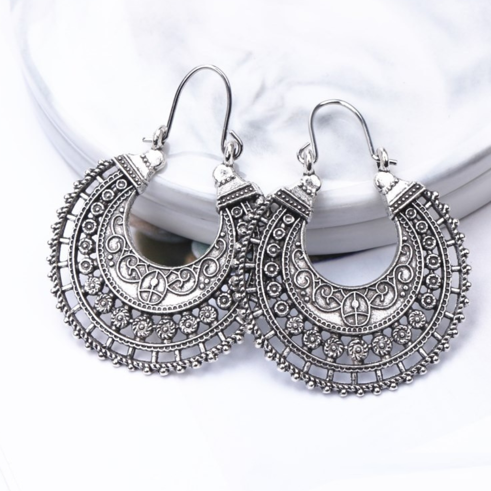 Delicate Tibetan 925 sterling silver filigree earrings for women, featuring intricate ethnic boho design.