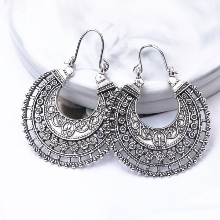 Delicate Tibetan 925 sterling silver filigree earrings for women, featuring intricate ethnic boho design.