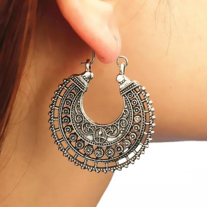 Women's 925 sterling silver hook earrings with intricate Tibetan filigree, perfect for a boho vintage look.