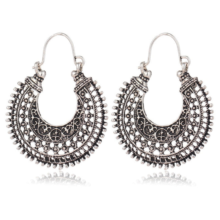 Exquisite delicate Tibetan 925 silver filigree earrings, handcrafted for women with an ethnic boho style.
