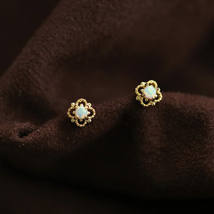 Delicate vintage opal drop earrings for women, an elegant fashion jewelry piece.