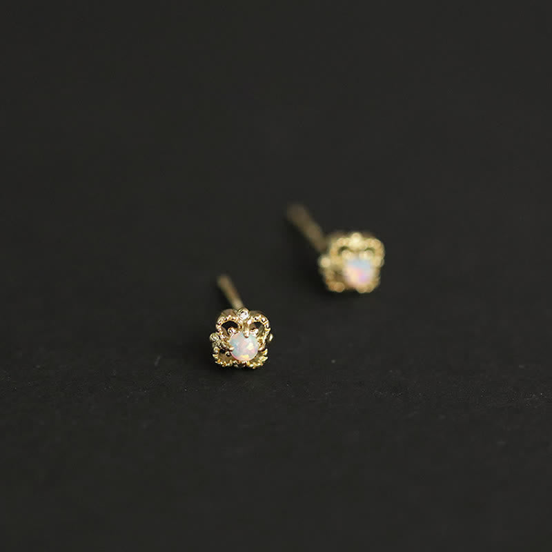 Side view of delicate vintage opal drop earrings for women, exquisite craftsmanship.