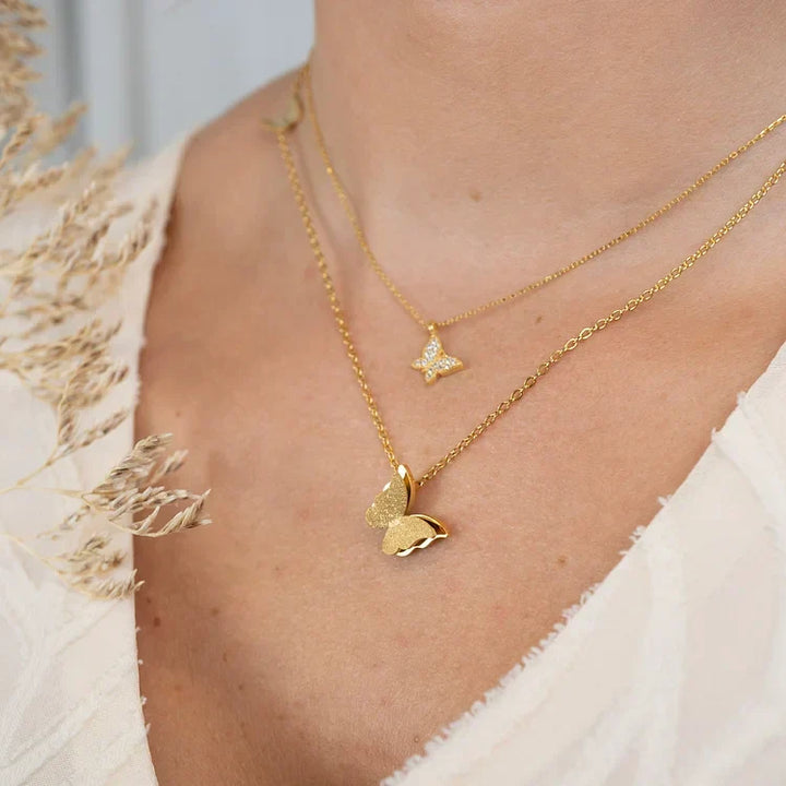 Women's elegant butterfly pendant necklace. A delicate jewelry piece & perfect gift for her, adding spring style.
