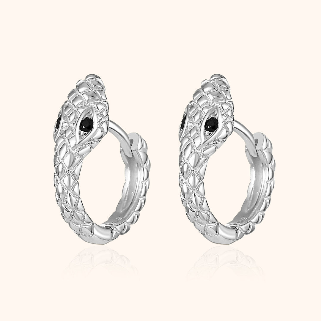 Women's compact snake hoop earrings, sterling silver with gold plating, offering a unique and delicate animal statement.