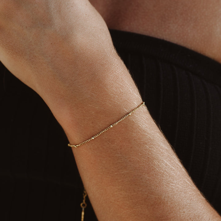 Delicate women's Liora subtle beaded bracelet, perfect for minimalist everyday wear. Adjustable chic accessory.