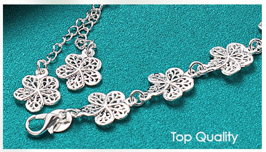 Adjustable silver filigree bracelet, delicate women's jewelry. Elegant design, great gift.