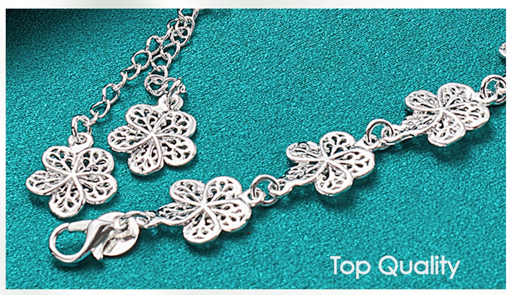 Adjustable silver filigree bracelet, delicate women's jewelry. Elegant design, great gift.
