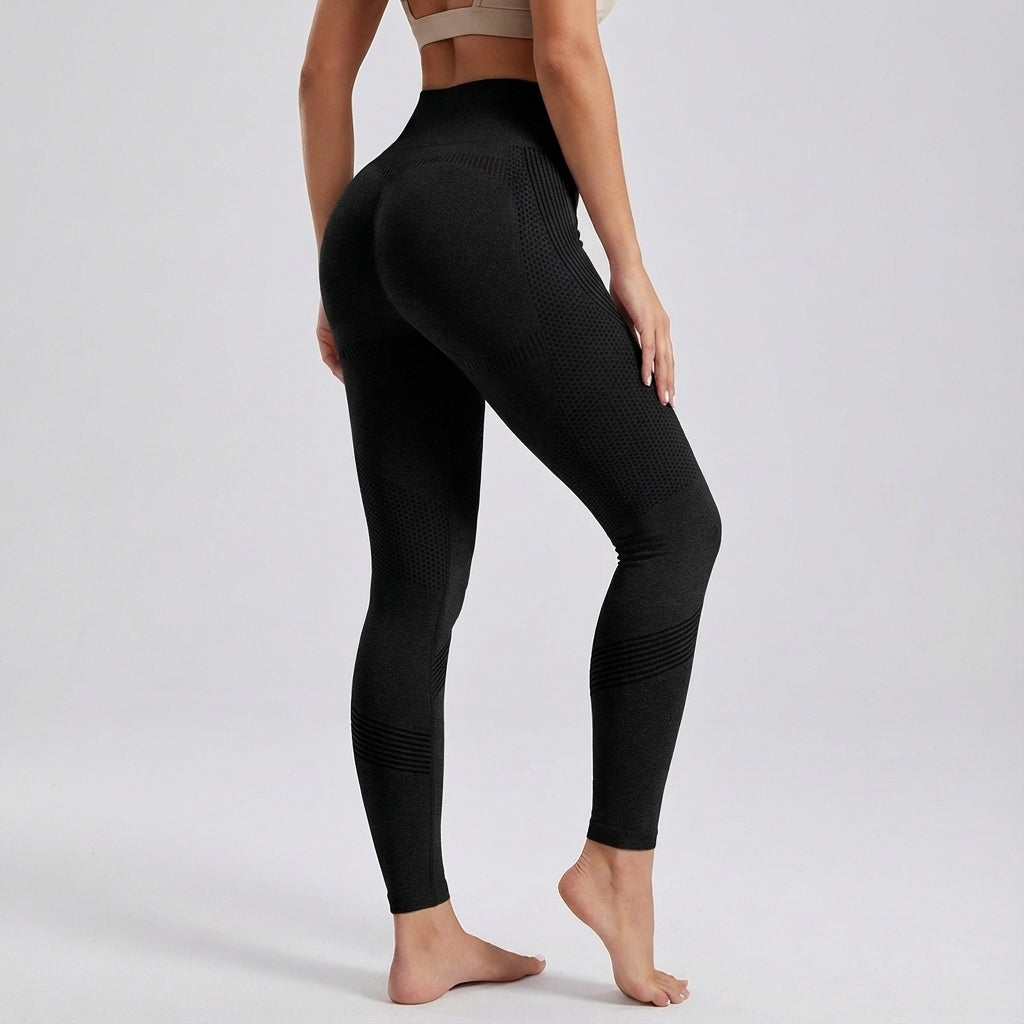Full length view of women's sculpting high-waisted sports leggings, essential workout pants