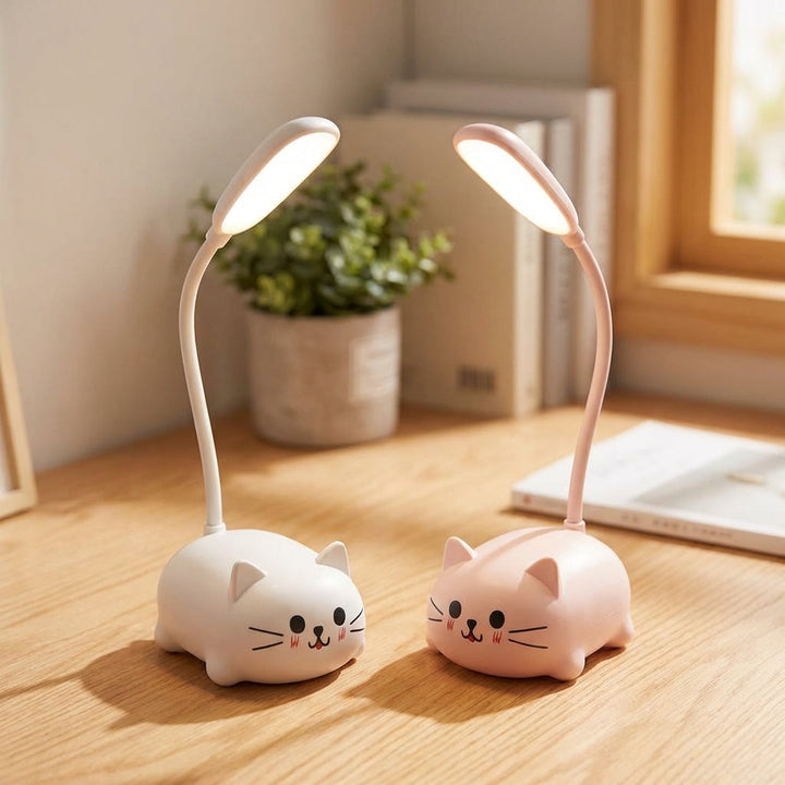 Deskpurr USB LED desklamp, cute cat-shaped, white with glowing ears for office or study.