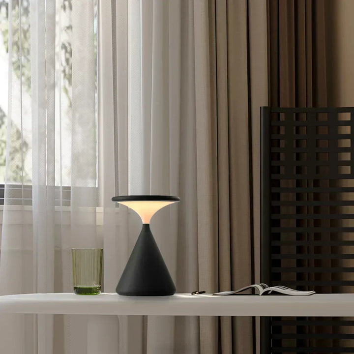 Stylish cordless hourglass lamp, warm dimmable LED, adds ambient light to modern spaces
