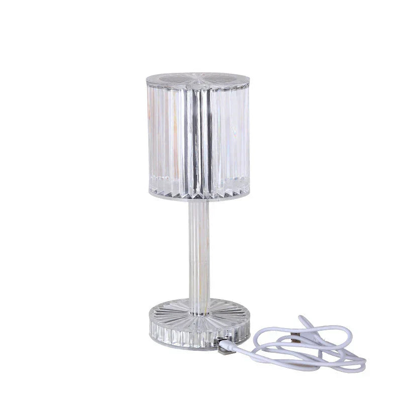 Seraphine dimmable crystal table lamp providing ambient LED light. Modern home decor for bedroom & living room.