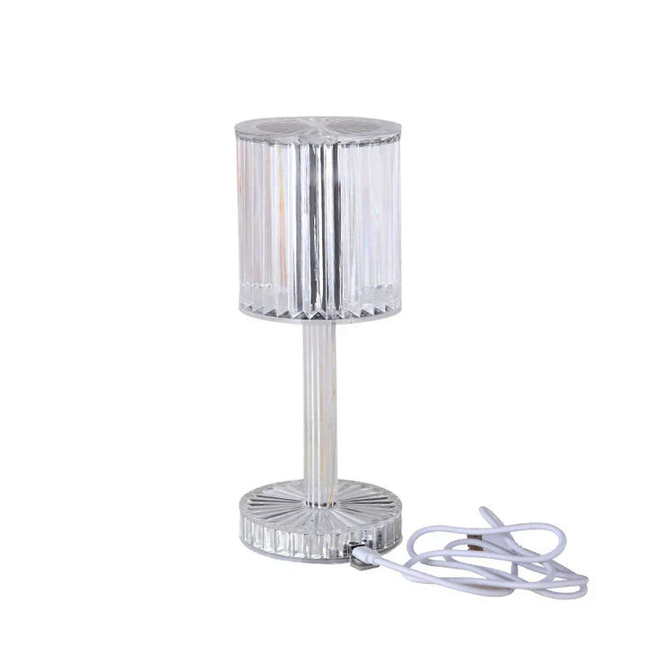 Seraphine dimmable crystal table lamp providing ambient LED light. Modern home decor for bedroom & living room.